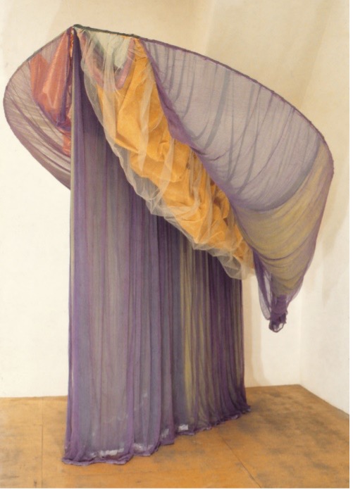 Rosemary Mayer, Galla Placida, 1973, satin, rayon, nylon,<br />
cheesecloth, nylon netting, ribbons, and wood, with dyes<br />
and acrylic paint.  108 x 120 x 60 inches.  Photo courtesy<br />
Rosemary Mayer Estate.<br />
